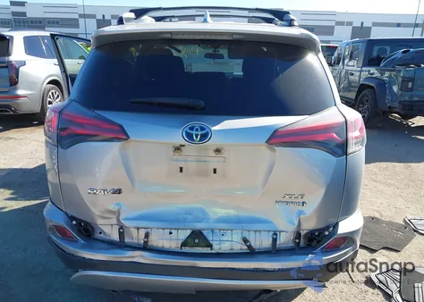 2016 Toyota Rav4 Hybrid Xle z USA, uszkodzony, nr VIN JTMRJREV6GD047257